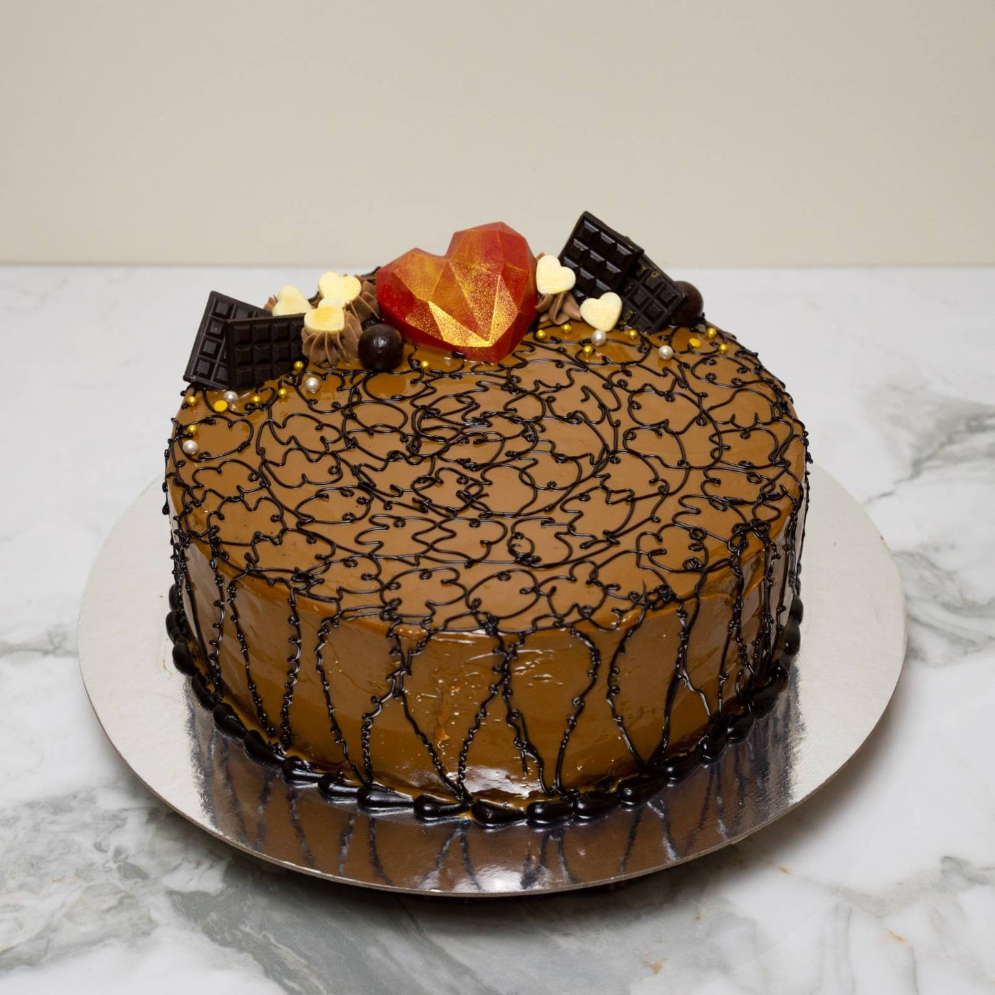 Chocolate Caramel Cake with Heart Theme